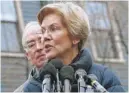  ?? BILL SIKES/AP ?? Sen. Elizabeth Warren, D-Mass., speaks Monday beside her husband, Bruce Mann.
