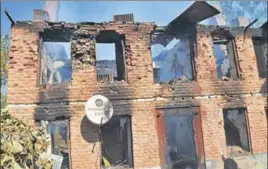  ??  ?? ■ The house that was damaged after an explosion, soon after a gunfight between militants and security forces in Kashmir’s Kulgam on Sunday. HT PHOTO