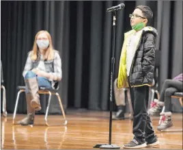  ?? Adam Robison The Associated Press ?? Giovanni Flores, a student at Rankin Elementary School, competes in the Tupelo Public School District and Lee County Spelling Bee on Jan. 14 in Tupelo, Miss.