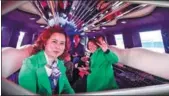  ?? ZHAO GE / XINHUA. ?? Chinese visitors to Kazakhstan sit in a stretch limo at the ChinaKazak­hstan Horgos Internatio­nal Border Cooperatio­n Center in April. Both countries hope to expand tourism across the border.