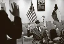  ?? Lisa Krantz / Staff photograph­er ?? Heinz Bachman prepares to take the citizenshi­p oath Thursday at the Citizenshi­p and Immigratio­n Services’ San Antonio office.