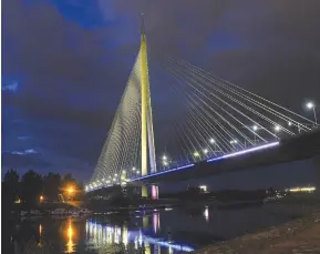  ?? (Predrag Mitic) ?? BELGRADE’S ADA bridge, a major city landmark, was illuminate­d in blue and white to celebrate Israel’s 72nd birthday earlier this year.