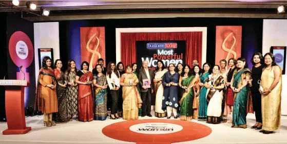  ??  ?? Winners of the Business Today Most Powerful Women Awards for Business and Impact Women with Subhash Desai, Minister for Industries, Govt of Maharashtr­a, Raj Chengappa, Group Editorial Director, India Today Group, and Prosenjit Datta, Editor, Business...