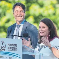  ?? ANDREW VAUGHAN/THE CANADIAN PRESS ?? Eric Hoskins and Linda Silas, of the Canadian Federation of Nurses Unions, addressed the premiers on plans to implement a national pharmacare program.