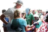  ?? ?? Angel of Hope Foundation partners from the US, Mrs Roz Peterson and her husband Mr Guy Peterson, check the blood pressure of patients during a free medical outreach organised by First Lady Dr Auxillia Mnangagwa in Kanyemba recently.