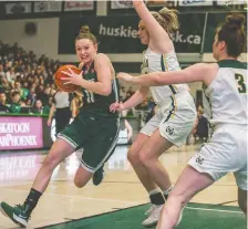  ?? LIAM RICHARDS ?? Summer Masikewich, left, a fourth-year forward from Calgary, has averaged 17.4 points per game and 9.1 rebounds for the Saskatchew­an Huskies, hailed as the ones to beat in the Final 8 women’s national basketball tournament, which gets underway Thursday in Ottawa.