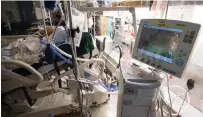  ?? JONATHAN HAYWARD THE CANADIAN PRESS ?? A patient is attached to a ventilator in a COVID-19 intensive care unit. It’s the type of vital equipment biomedical technologi­sts are trusted to maintain.