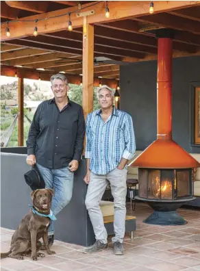  ??  ?? RIGHT: MOD WEST RANCH’S OWNERS, MICHAEL VON WITTENAU ( LEFT) AND BOB BOGARD, WITH THEIR POOCH JOSHUA.