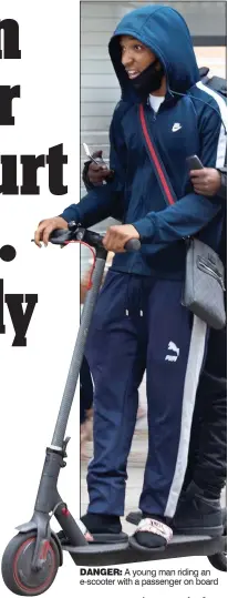  ??  ?? DANGER: A young man riding an e-scooter with a passenger on board