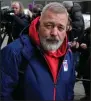  ?? (AP/Alexander Zemlianich­enko) ?? Dmitry Muratov, editor-in-chief of Novaya Gazeta, leaves Moscow City Court after Tuesday’s ruling, which he said “serves a bunch of people who want to leave the nation facing only propaganda.”