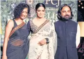  ??  ?? Sabyasashi Mukherjee (pictured here with Gauri Shinde and Sridevi) feels flattered to have his designs copied