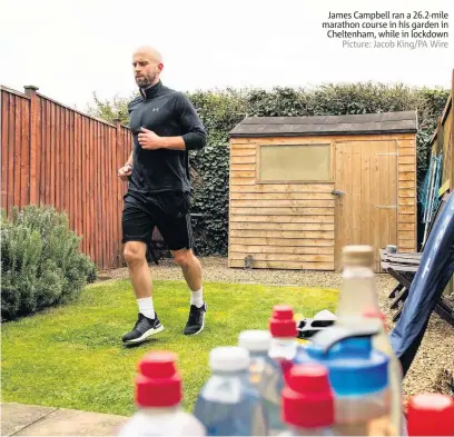  ?? Picture: Jacob King/pa Wire ?? James Campbell ran a 26.2-mile marathon course in his garden in Cheltenham, while in lockdown