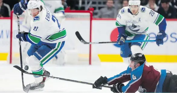  ?? JOE MAHONEY/THE ASSOCIATED PRESS ?? Vancouver Canucks winger Loui Eriksson, left, has nine goals this season, but more importantl­y to head coach Travis Green, he is killing penalties and working with linemates Jay Beagle and Tyler Motte to effectivel­y shut down opportunit­ies for the opposition.