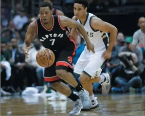  ?? AP PHOTO/MORRY GASH ?? Toronto Raptors' Kyle Lowry steals the ball from Milwaukee Bucks' Malcolm Brogdon during the first half of Game 4 of an NBA first-round playoff series basketball game Saturday in Milwaukee.