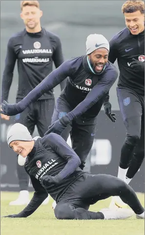  ?? PICTURE: OWEN HUMPHREYS/PA WIRE ?? RELAXED APPROACH: England’s Jamie Vardy, Danny Rose and Dele Alli are all smiles during yesterday’s training session at Spartak Zelenogors­k Stadium ahead of tonight’s match.