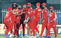  ?? ?? Punjab Kings celebrate a Sunrisers Hyderabad wicket