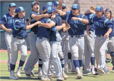  ?? MARLA BROSE/JOURNAL ?? Goddard celebrates after beating St. Pius in Friday’s semifinal game at Santa Ana Star Field. The Rockets play Albuquerqu­e Academy in today’s final at Isotopes Park.