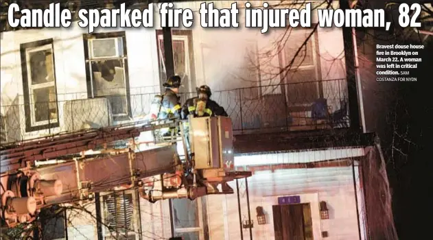  ?? SAM COSTANZA FOR NYDN ?? Bravest douse house fire in Brooklyn on March 22. A woman was left in critical condition.