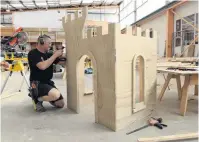  ?? PHOTO: LINDA ROBERTSON ?? Dream playhouse . . . GJ Gardner carpentry apprentice Jeff Bell builds a children’s castle playhouse as part of the Dunedin heat of the New Zealand Certified Builders Apprentice Challenge.