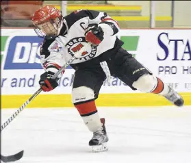  ?? FILE ?? Jacob Melanson of the Truro Bearcats fires the puck during recent NSMBHL action in Truro. Melanson sniped five goals to lead the Bearcats to an 8-2 romp over the Western Hurricanes on Sunday.