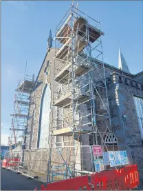  ?? (Photo courtesy: Fr Brian Boyle) ?? Scaffoldin­g went up on St Patrick’s Church, Fermoy, the beginning of phase 1 of restoratio­n works as three pinnacles, that were in danger of collapsing, are being repaired.