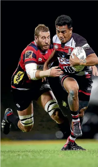  ?? GETTY IMAGES ?? Canterbury lock Luke Romano does his best to hold back Counties’ Luteru Laulala at Pukekohe.