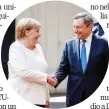  ?? ANSA ?? Stretta di mano tra Angela Merkel e il premier Mario Draghi durante l’ultima visita ufficiale della Cancellier­a