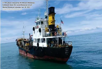  ?? CONTRIBUTE­D PHOTO ?? THIS photo released by the Western Mindanao Command shows the seized Malaysian vessel Marina Penang on Saturday, Jan. 28, 2023.