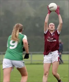  ??  ?? Amy Cardiff of St. Martin’s catches as Lynn Gregg looks on.