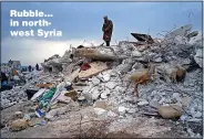  ?? ?? Rubble... in northwest Syria