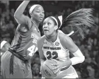  ?? AP file photo ?? Center Chinwe Okorie (left) and the Mississipp­i State Bulldogs, the No. 2 seed in the Oklahoma City Regional, host No. 15 seed Troy in the first round of the NCAA Women’s Tournament. Mississipp­i State’s last home game was a lopsided loss to Tennessee...