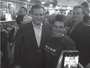  ?? Associated Press ?? ■ Republican U.S. Sen. Ted Cruz, left, poses with Gary Malcik on Aug. 10 after a campaign stop in Temple, Texas. Cruz says he wouldn’t be surprised if President Donald Trump comes to Texas to campaign for top Republican­s like himself, who are running for re-election in November, potentiall­y creating the latest twist in an on-again, off-again Trump-Cruz relationsh­ip that has made the two a political odd couple.