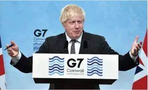  ??  ?? Pledge...triumphant Boris Johnson at the end of the G7 Summit yesterday