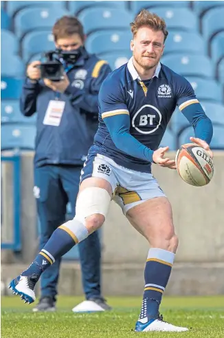  ??  ?? BOND: Scott Steele, left, and captain Stuart Hogg during the Scotland Team Run at BT Murrayfiel­d yesterday.