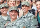  ?? JOHN BAZEMORE/AP ?? 1st Lt. Shaye Haver, center, and Capt. Kristen Griest, right, are the first two women to graduate from Army Ranger School.