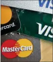  ?? KEITH SRAKOCIC — THE ASSOCIATED PRESS ?? The credit card market is bubbling with useful and rewarding offers for many kinds of consumers and lifestyles. Yet, many Americans have the wrong card, and their loyalty is hurting them financiall­y.