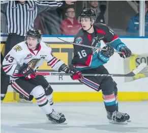  ?? — GETTY IMAGES FILES ?? Kelowna Rockets head coach Jason Smith says winger Kole Lind, right, seen in last Friday’s game against the Portland Winterhawk­s, ‘is trending in the right way. He’s maturing.’