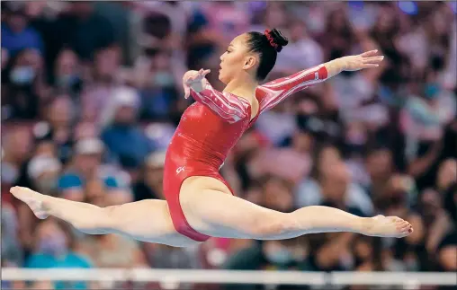  ?? (File Photo/AP/Jeff Roberson) ?? Kara Eaker competes in the floor exercise June 25 during the women’s U.S. Olympic Gymnastics Trials in St. Louis. Eaker, an alternate on the United States women’s gymnastics team, has tested positive for covid-19 in an Olympic training camp in Japan.