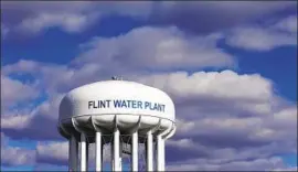  ?? CARLOS OSORIO Associated Press ?? WATER CONTAMINAT­ION in Flint, Mich., was one of the worst man-made environmen­tal disasters in U.S. history. Some residents still use bottled water.