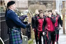  ??  ?? Mourners as the hearse of Colin, left, slows down, players are piped into the service and club chairwoman Jacqui Low talks to fans, below