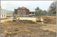  ?? NWA Democrat-Gazette/ANDY SHUPE ?? Work continues Thursday at the site of the planned Student Success Center just north of Old Main on the University of Arkansas campus in Fayettevil­le. The Walmart Foundation pledged a $5 million grant to support the four-story center, which is set to open in early 2022.