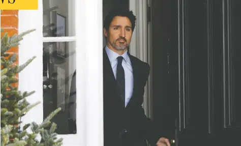  ?? BLAIR GABLE/REUTERS ?? Prime Minister Justin Trudeau steps out of his home in Ottawa Friday to announce measures to help Canadians and businesses hit by the virus.