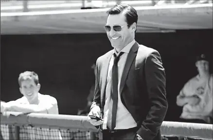  ?? WALT DISNEY STUDIOS ?? Struggling sports agent J.B. Bernstein (Jon Hamm): Is cricket just his ticket?