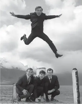  ?? AP, STUFF ?? In this 1964 photo, Gerry Marsden leaps over his band, the Pacemakers. Above right, Marsden on Takapuna beach in Auckland during a 2013 tour.