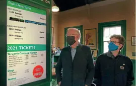  ??  ?? Swanage Railway passenger services director Trevor Parsons (left) and Realtime Trains founder Tom Cairns with one of the screens at Corfe Castle station. ANDREW PM WRIGHT