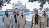  ??  ?? Cops deployed near the Golden Temple replica at Mastuana Sahib in Sangrur on Tuesday. AVTAR SINGH/HT