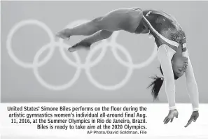  ?? AP Photo/David Goldman, File ?? United States’ Simone Biles performs on the floor during the artistic gymnastics women's individual all-around final Aug. 11, 2016, at the Summer Olympics in Rio de Janeiro, Brazil. Biles is ready to take aim at the 2020 Olympics.