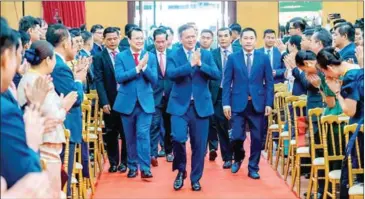  ?? STPM ?? Prime Minister Hun Manet (centre) and Agricultur­e Minister Dith Tina (centre left) attend the official launch of the government’s 5th and 6th Priority Policy Programmes on November 20.