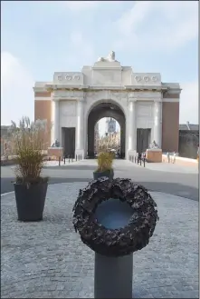  ?? PHOTO COURTESY MARIA HART ?? Left: The Menin Gate Memorial in Ypres, Belgium and the street on which the soldiers marched to the front. Right: "The Iron Harvest" artifacts at the Hooge Crater Museum.