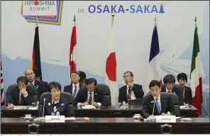  ?? (AP/Kyodo News) ?? Foreign Minister Yoko Kamikawa (left) and Yasutoshi Nishimura (right), the Japanese minister in charge of trade and economy, attend a G7 Trade Ministers’ Meeting on Sunday in Osaka, Japan.